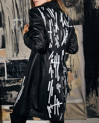 matrix leather trench coat.